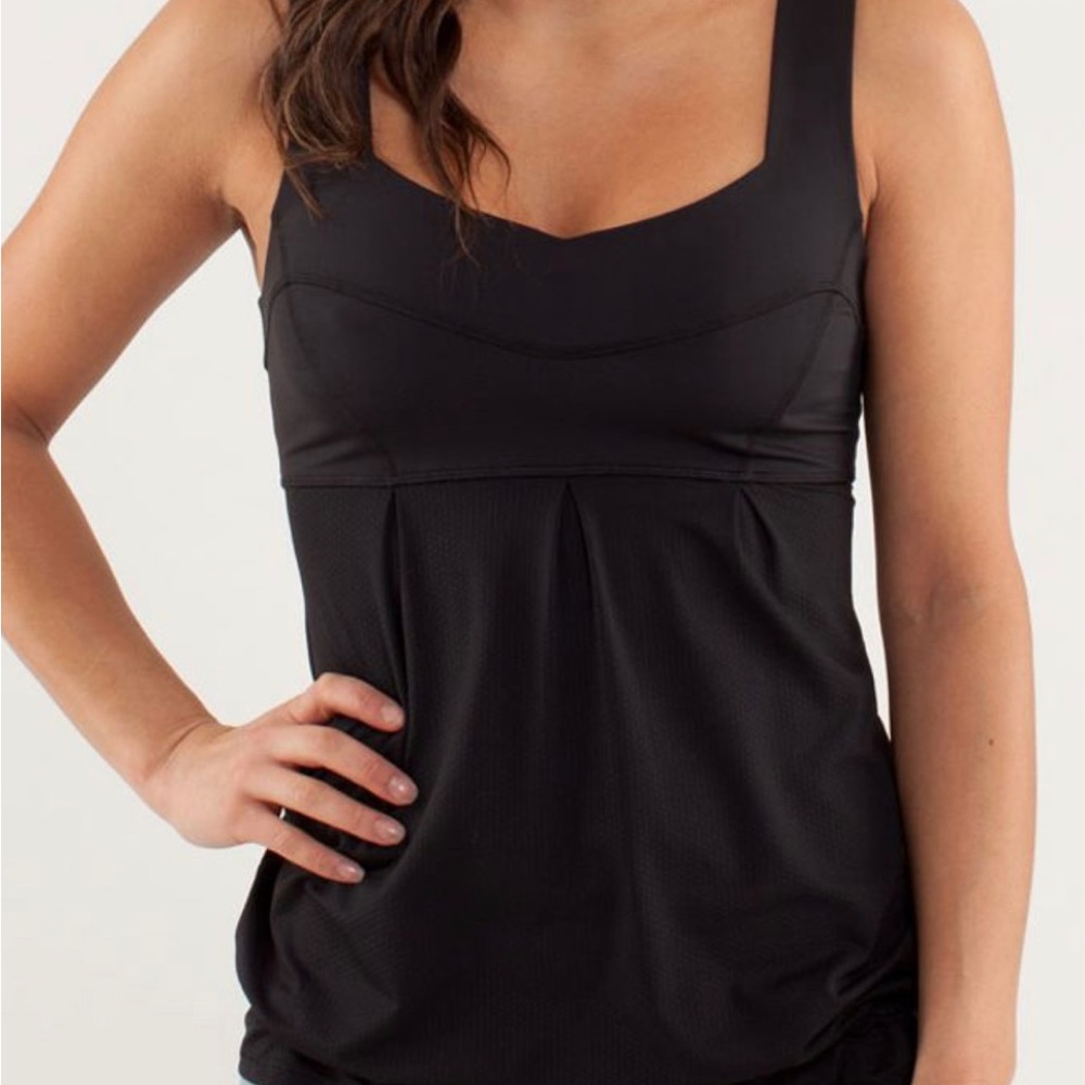 Lululemon Tame Me Run tank.  Color black, size 4. Excellent used condition.